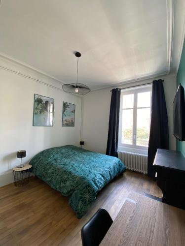 Posteľ alebo postele v izbe v ubytovaní Le VH - Appartement 3 chambres
