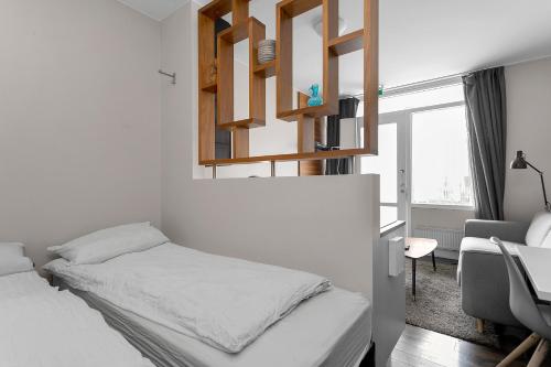 Postel nebo postele na pokoji v ubytování Cozy Studio Apartment - Quiet Neighborhood