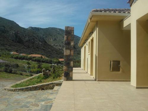 a building with a view of a mountain at Villa Cazala in Monemvasia
