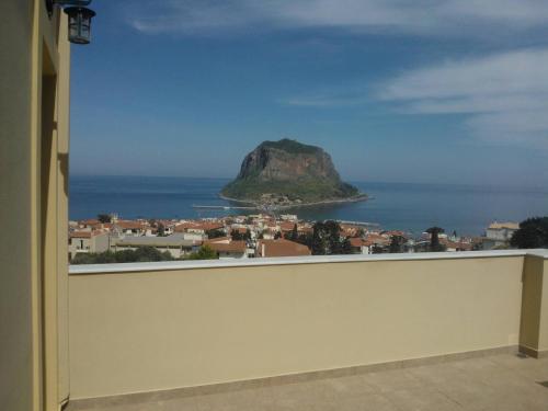 a view of a small island in the ocean at Villa Cazala in Monemvasia