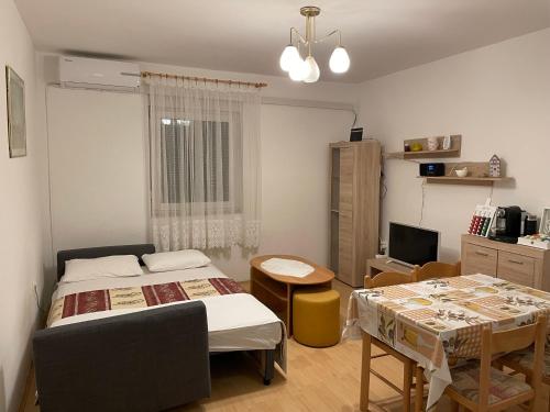 Postel nebo postele na pokoji v ubytování Slanica Mak