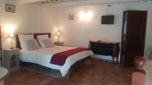 Postel nebo postele na pokoji v ubytování Moulin d'Antelon B&B