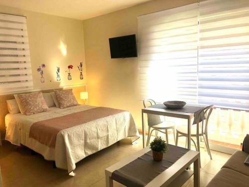 Apartamentos Primera línea playa cuatro