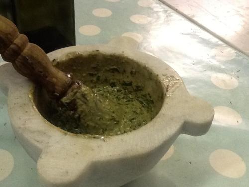 a clay pot with a stick in it at Agriturismo Saudon in Mulazzo