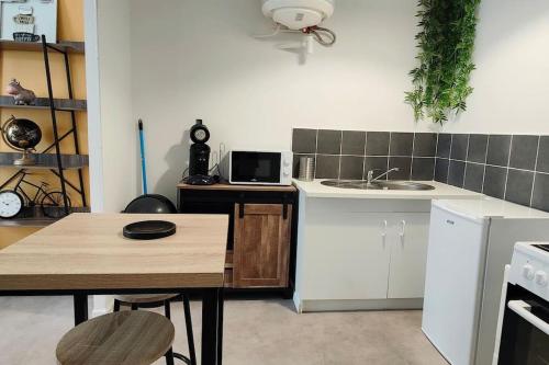 Köök või kööginurk majutusasutuses Bel appartement face Citadelle