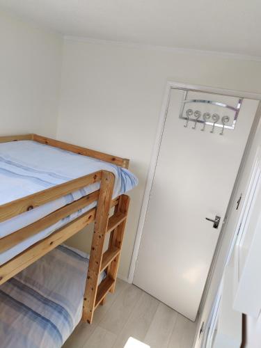 Postel nebo postele na pokoji v ubytování Heacham Hideaway