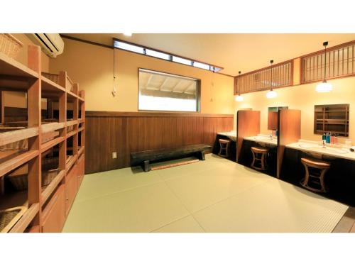 a large bathroom with two sinks and two counters at Saikatei Jidaiya - Vacation STAY 96435v in Kaminoyama