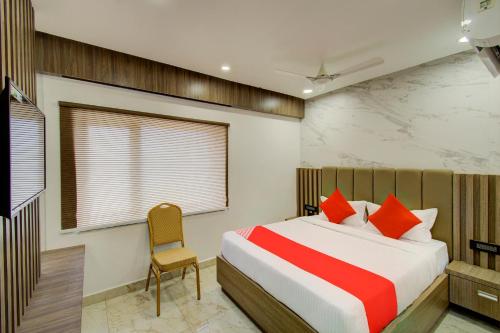 Katil atau katil-katil dalam bilik di Capital O V Hotel