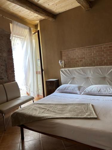 Katil atau katil-katil dalam bilik di B&B Casa CamiLory