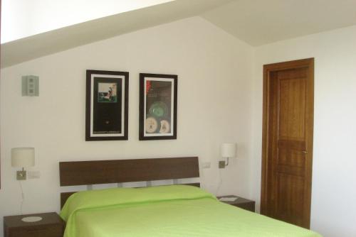 Una cama o camas en una habitación de Agriturismo Ai Monaci