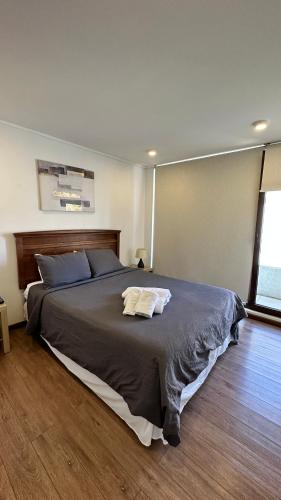 Ένα ή περισσότερα κρεβάτια σε δωμάτιο στο Apart Hotel Castellon 176