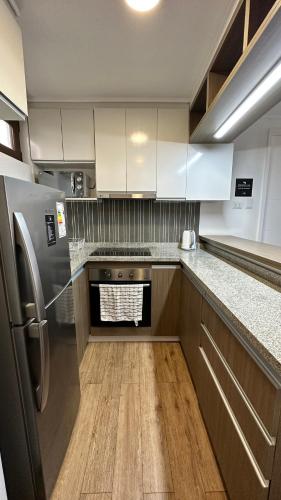Η κουζίνα ή μικρή κουζίνα στο Apart Hotel Castellon 176