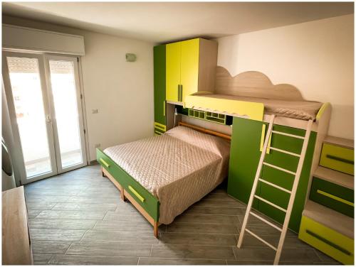 A bed or beds in a room at Casa Larentu