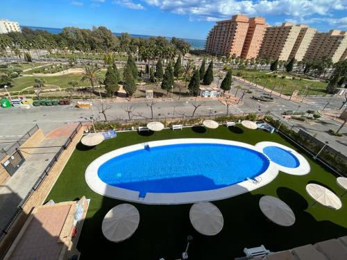 Bazén v ubytování Marina Dor Costa de Azahar I Oropesa del Mar - Vistas al Mar - Planta 4 nebo v jeho okolí