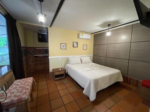 Postel nebo postele na pokoji v ubytování HOTEL CAMPESTRE MANOA