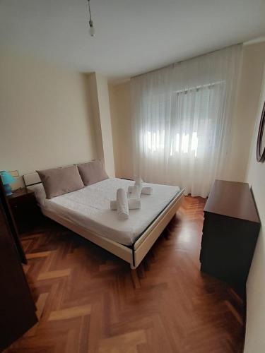A bed or beds in a room at Xardin