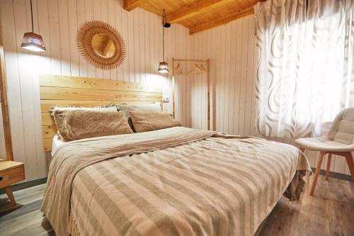 Postel nebo postele na pokoji v ubytování Casa Montse. Apartamentos turísticos