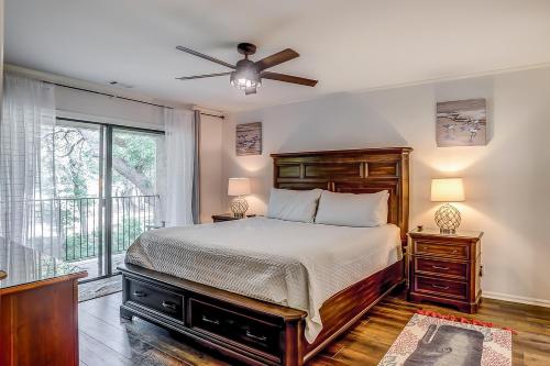 a bedroom with a bed and a ceiling fan at Beckenham 209 in Hilton Head Island