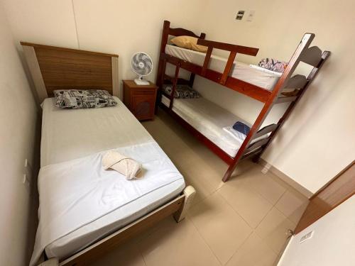 Postel nebo postele na pokoji v ubytování VENUS - 3DORM CONFORTO AR COND & CHARME, na melhor localização Máx 7