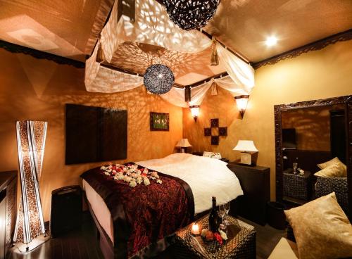 Voodi või voodid majutusasutuse Hotel Asian Resort toas