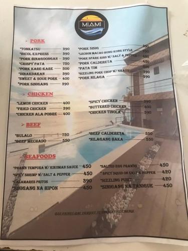 a picture of a menu for a restaurant at Miami Heat Beach Resort in Morong