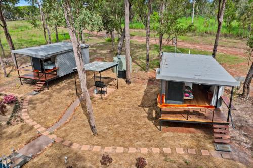 an overhead view of a tiny house and a table at Litchfield Tropical Stay in Batchelor