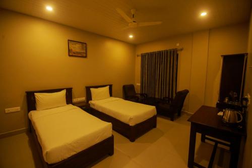 Cama o camas de una habitación en CeeCee Grand