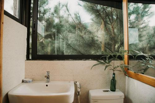 Ванная комната в LEE & Sau Sau Garden - Venuestay