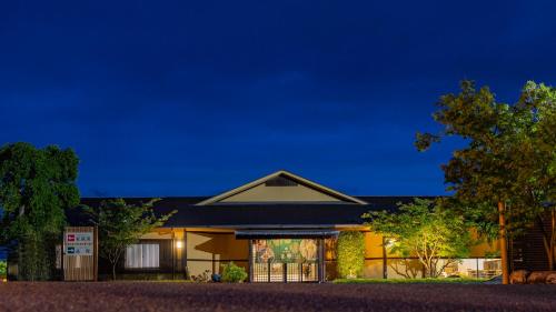 a rendering of a building at night at 那古井館別邸　玉響[TAMAYURA] in Tamana