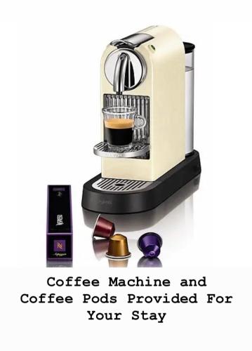 a coffee machine with a coffee pods provided for your stay at Shelley’s Seaside Stay (Garden/ Double Drive) in Porthcawl