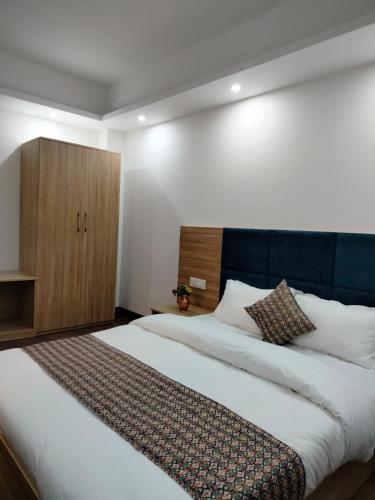 Cama o camas de una habitación en Shanol Residency