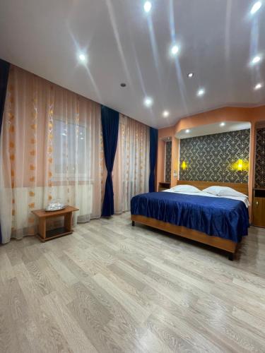 Ένα ή περισσότερα κρεβάτια σε δωμάτιο στο Pensiunea Relax