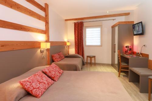 Postel nebo postele na pokoji v ubytování Hotel Restaurant 3 Châteaux
