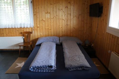 Postel nebo postele na pokoji v ubytování Haus Panorama B (Whg. Weibel)