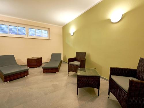 Χώρος καθιστικού στο Villa "Düne 4" - WG1 im EG mit Terrasse strandnah