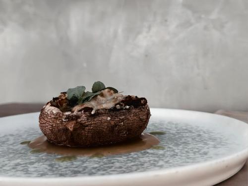 a dessert on a plate on a table at Louis Ledra Beach in Paphos City
