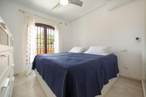 A bed or beds in a room at ALTOS DEL SOL by United Renters