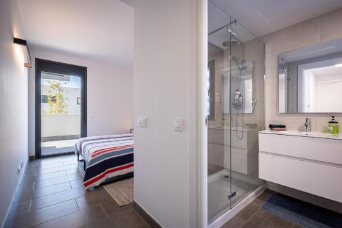 Kúpeľňa v ubytovaní AT307 Planta baja con piscina a pocos metros de la playa Cañadel
