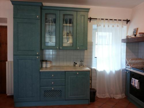 O bucătărie sau chicinetă la Green House - Blue House