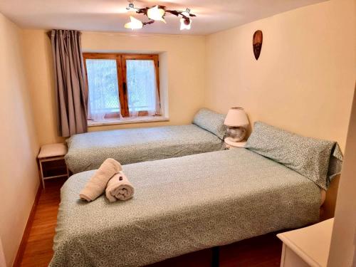 Postel nebo postele na pokoji v ubytování Casa rural Braulio