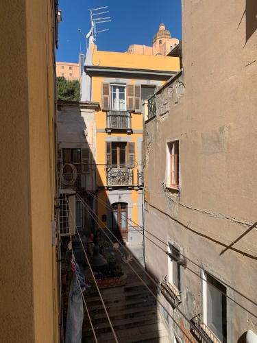 a view of an alley between two buildings at B&B Federica in Cagliari