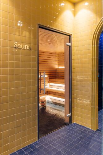 a bathroom with a sauna in a building at Mama Shelter Rennes in Rennes