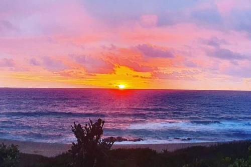 ウェストブルックにあるBlue Largo - Unit 41の夕日を眺めながらの海上の夕日