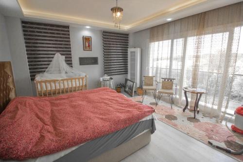 Säng eller sängar i ett rum på Kuşadası'nda Havuzlu 4+1 Villa