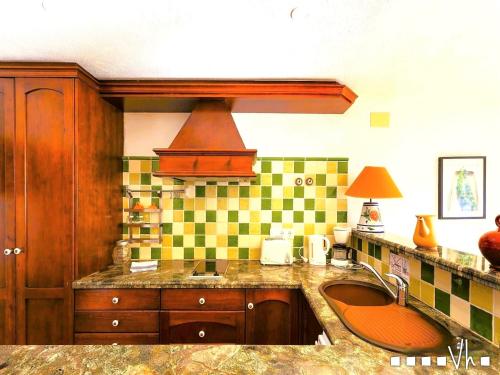 a kitchen with a sink and a counter top at VH CostaBlanca - EVA in Benissa