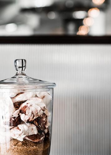a glass jar with food in it on a table at One&Only Le Saint Géran, Mauritius in Belle Mare