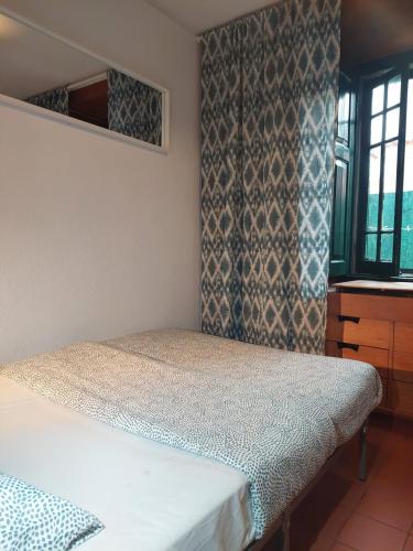 Ένα ή περισσότερα κρεβάτια σε δωμάτιο στο Beach House São Pedro