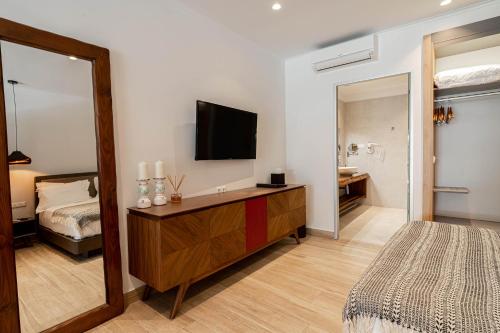 TV a/nebo společenská místnost v ubytování fns lounge suites