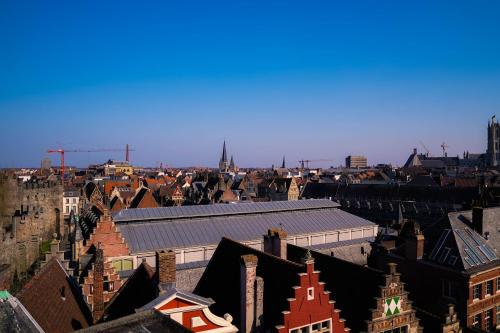 an aerial view of a city with buildings at Hotel Gravensteen in Ghent