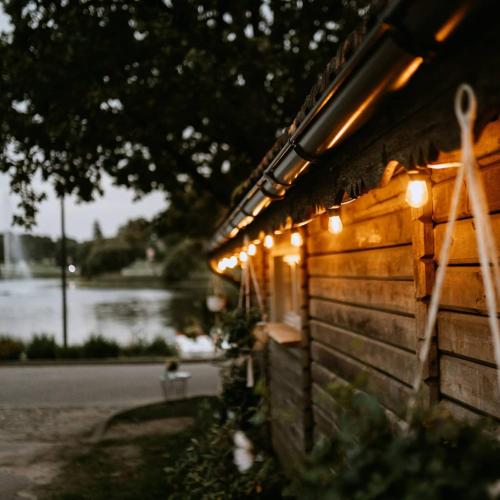 a string of lights on the side of a building at Apartaments Nr. 33 ( Viesu Nr. 4) in Talsi